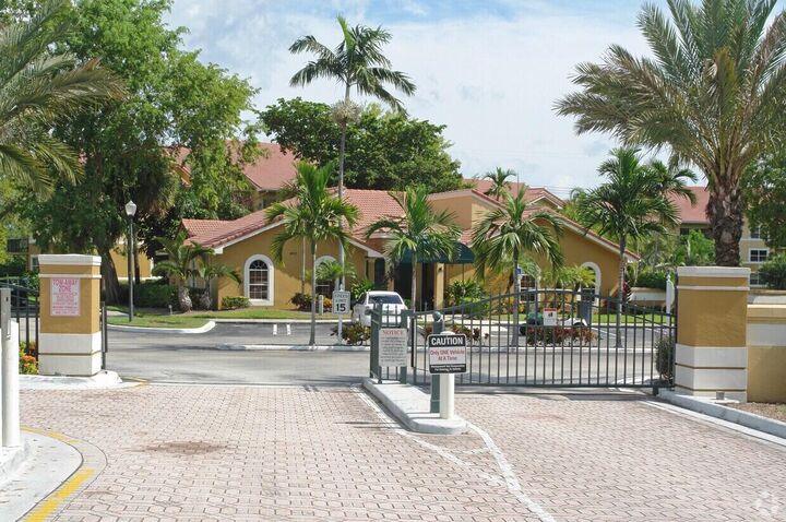 Property Photo:  8977 Wiles Road 203  FL 33067 