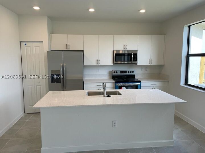 Property Photo:  10007 SW 231 Ln  FL 33190 