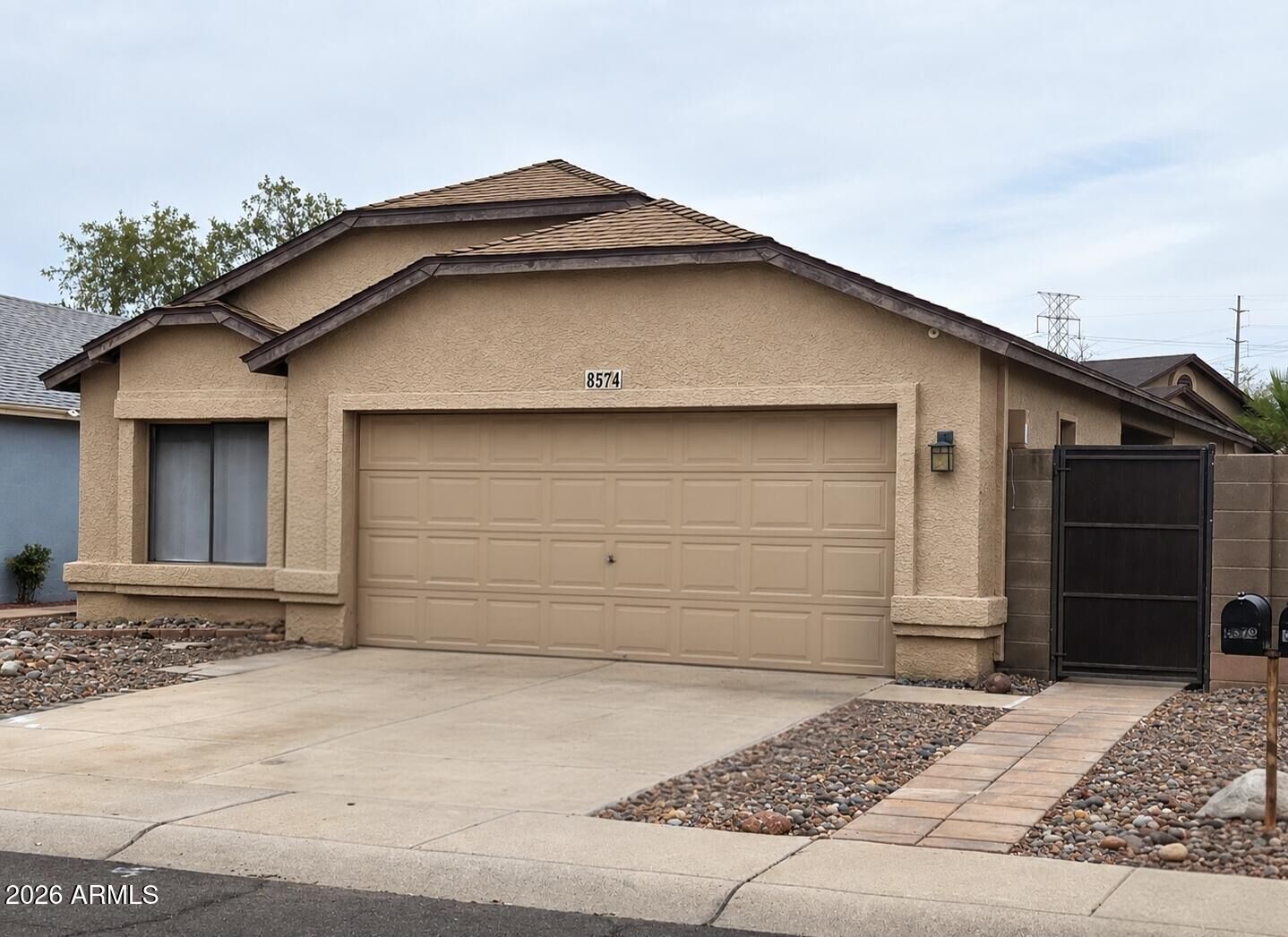 Property Photo: 8574 N 110th Avenue AZ 85345