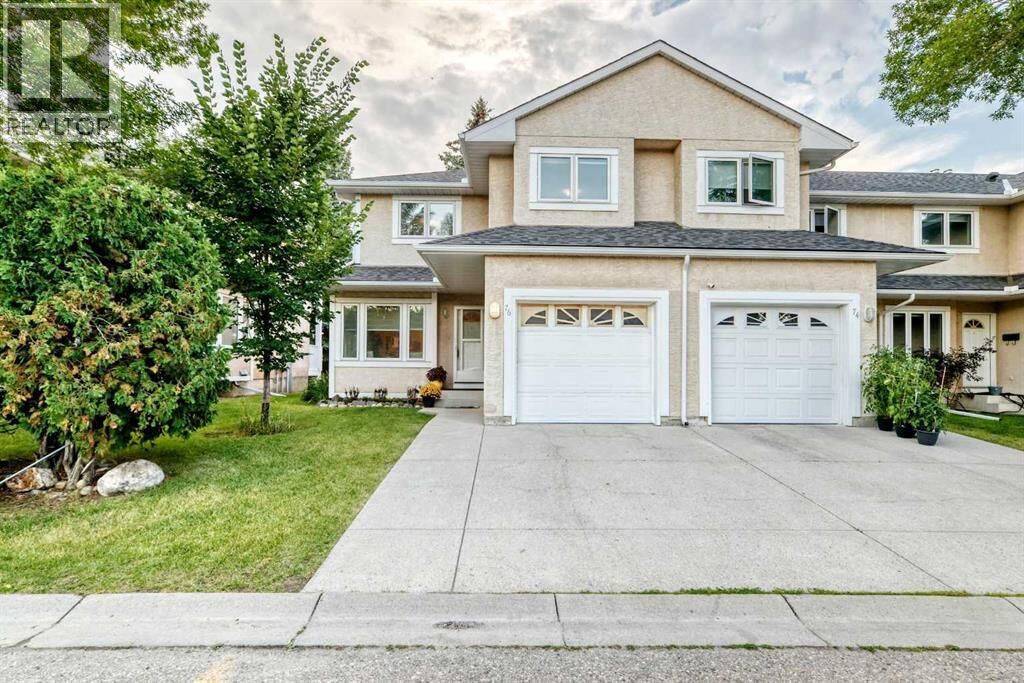Property Photo: 388 Sandarac Drive Northwest AB T3K 4E3