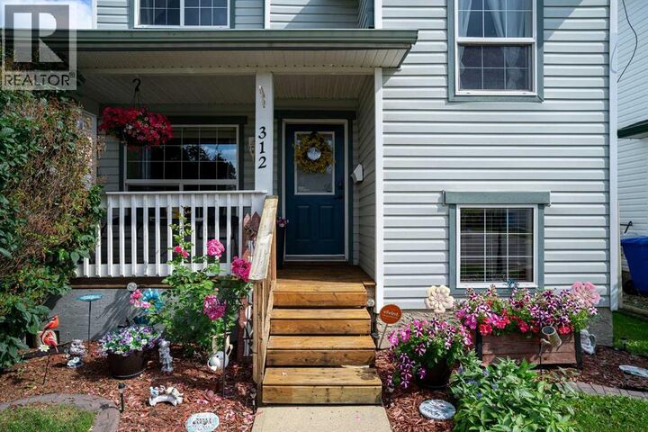 Property Photo:  312 Diefenbaker Drive  AB T9K 2K1 