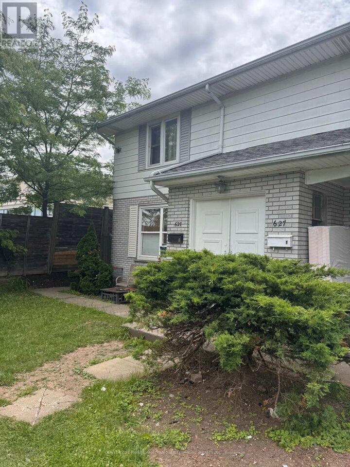 Property Photo: 627 Commissioners Road East 1 ON N6C 2T9
