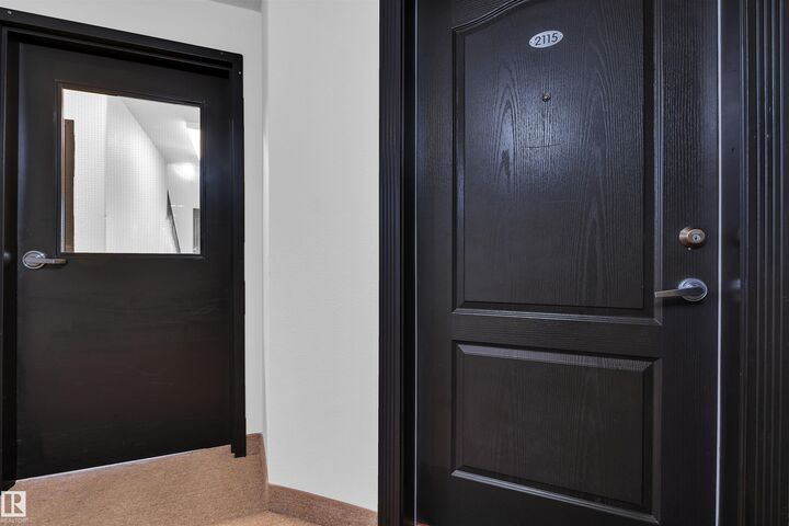 Property Photo: 9357 Simpson Drive NW 2115 AB T6R 0N3