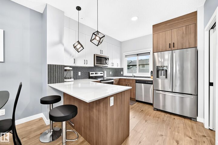 Property Photo:  6214 Cartmell Crest SW 15  AB T6W 5A7 