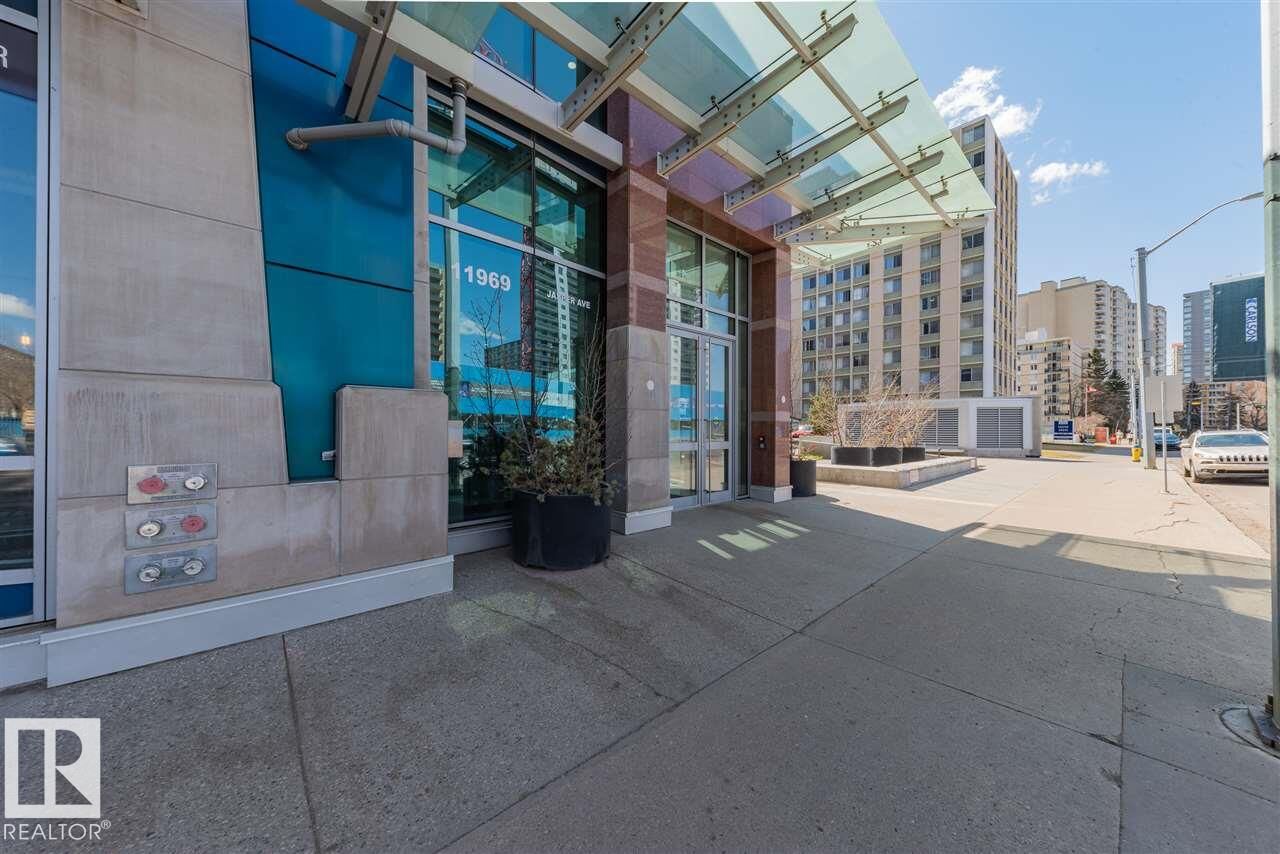 Property Photo: 11969 Jasper Avenue NW 401 AB T5K 0P1