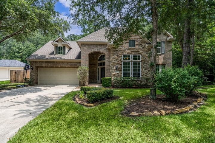 Property Photo: 11 Dahlia Trail Place TX 77382