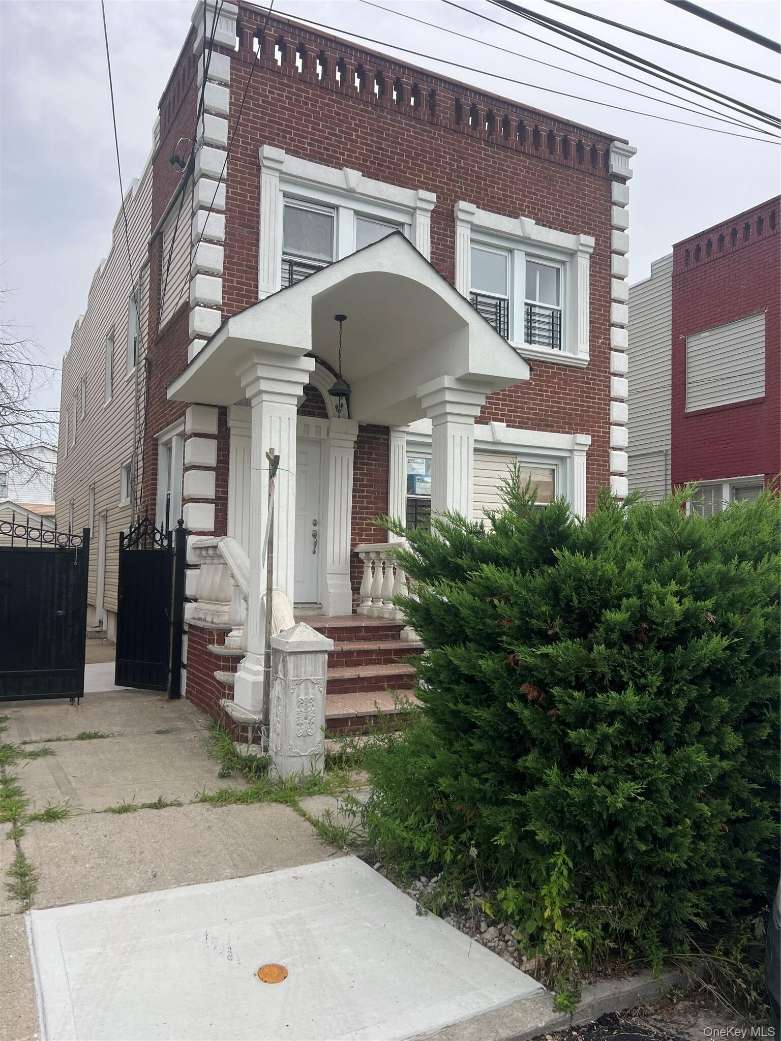 Property Photo:  216-25 136th Road  NY 11413 