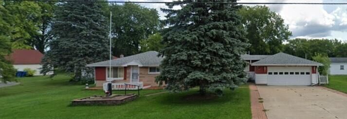 Property Photo:  1820 SE Boutell Road  MI 48732-9704 