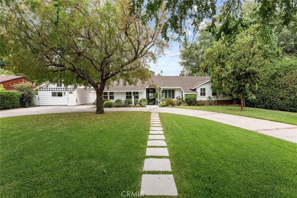 Property Photo:  5953 Lubao Avenue  CA 91367 
