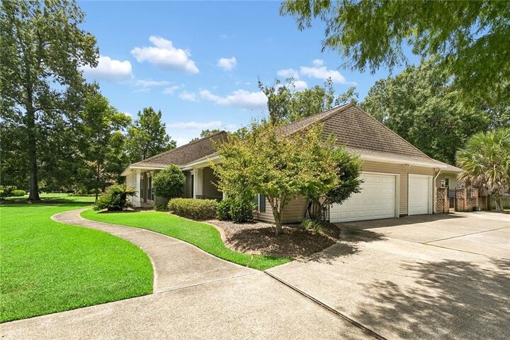 Property Photo: 126 Tchefuncte Parc Drive LA 70447