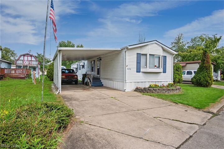 Property Photo: 430 Whispering Pines Drive SW OH 44481
