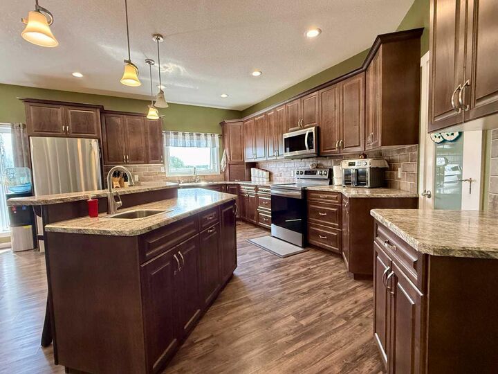Property Photo: 115017 Twp Rd 600A AB T7S 0C2