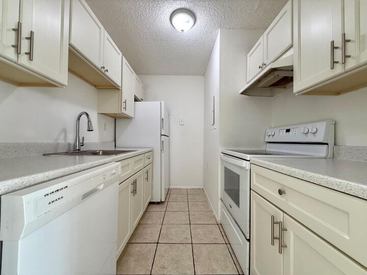 Property Photo:  1239 N Benoist Farms Road 110  FL 33411 