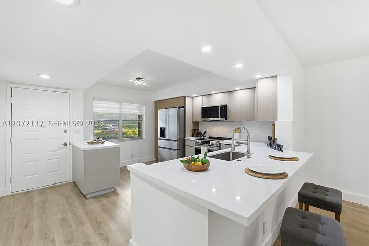Property Photo: 300 SW 130th Ter 110B FL 33027