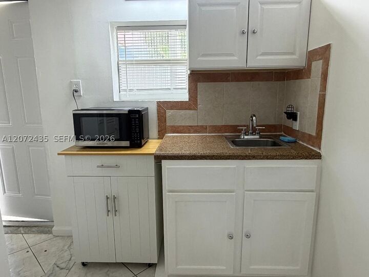 Property Photo:  8258 SW 148th Pl Rear  FL 33193 