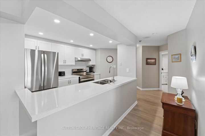 Property Photo: 712 Rossland Road E 615 ON L1N 9E8