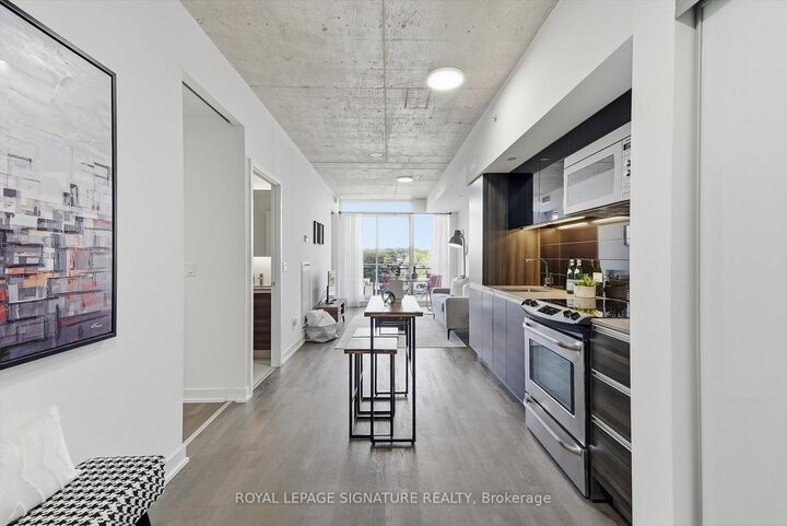 Property Photo:  1238 Dundas Street E 711  ON M4M 0C6 