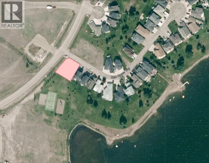 Property Photo:  58 Blue Heron Bay  AB T1R 1C5 