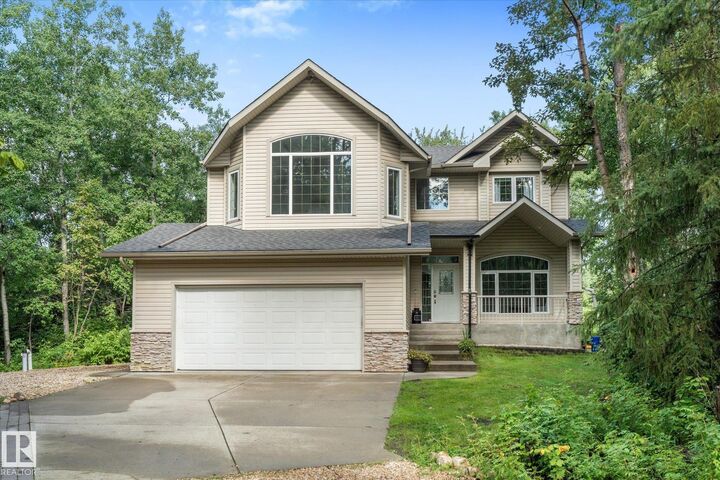 Property Photo: 27107 Twp Road 510 13 AB T7Y 1H6