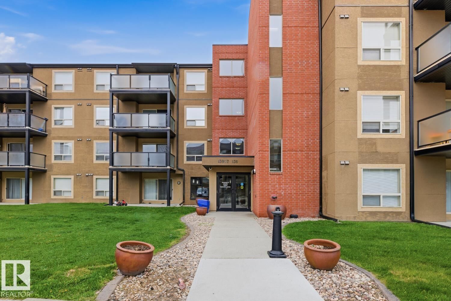 Property Photo:  13907 136 Street NW 106  AB T6V 1Y5 