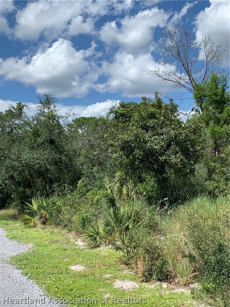 Property Photo: 9941 S Orange Blossom Boulevard FL 33875
