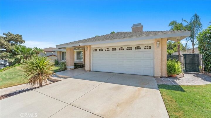 Property Photo:  8250 Whispering Tree  CA 92509 