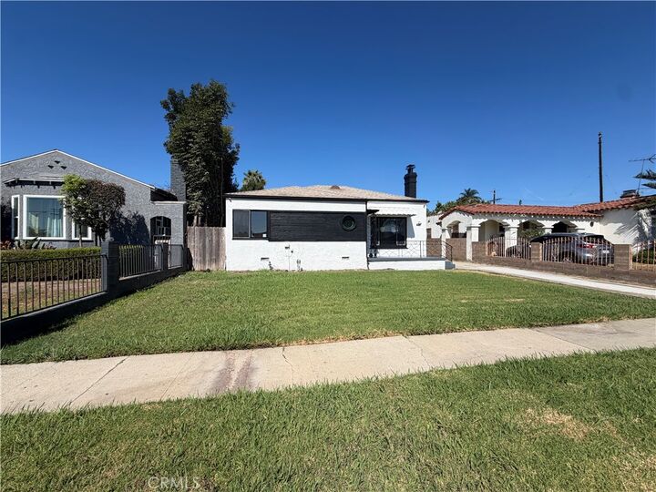 Property Photo:  9471 La Salle Avenue  CA 90047 