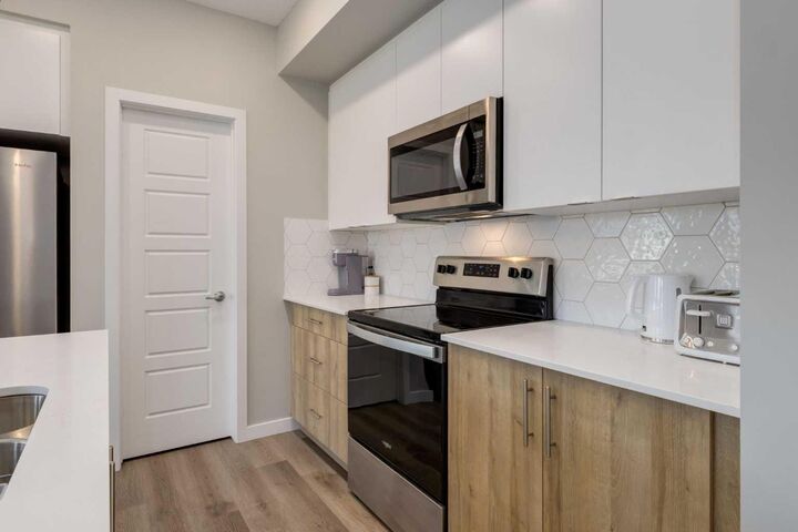 Property Photo:  1605 17 St Street SE 201  AB T2G 2L7 
