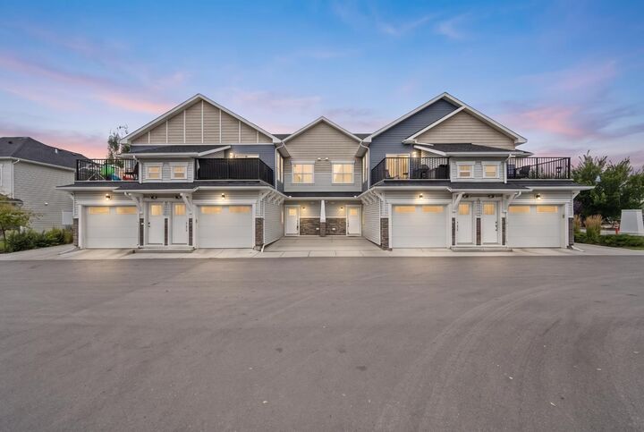 Property Photo: 115 Sagewood Drive SW 103 AB T4B 0M3