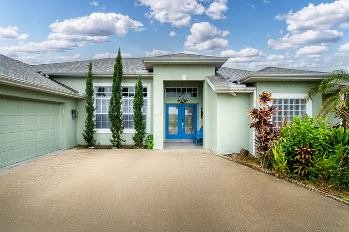 Property Photo:  6715 NW Pinson Court  FL 34983 