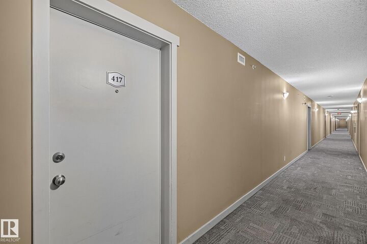 Property Photo: 12045 22 Avenue SW 417 AB T6W 2Y2