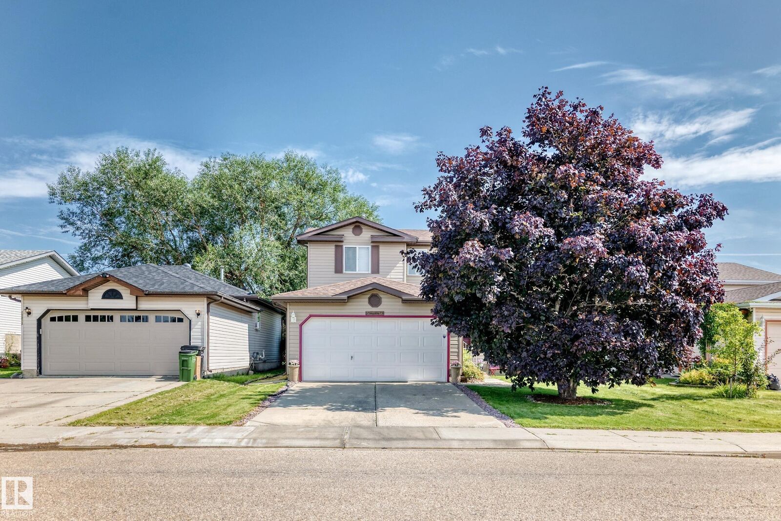 Property Photo:  13069 37 Street NW  AB T5A 5A4 