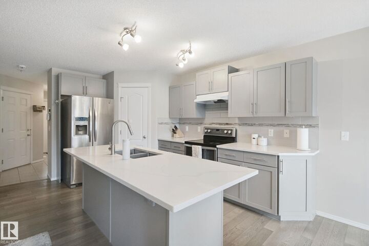 Property Photo: 735 176 Street SW AB T6W 2G8