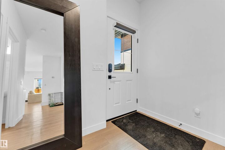 Property Photo: 3236 Chernowski Way SW AB T6W 5H2