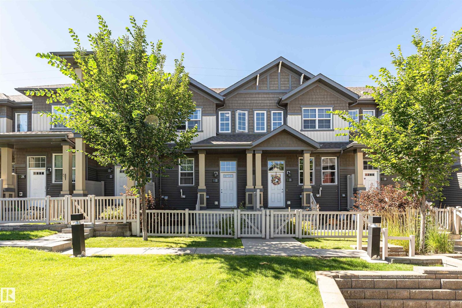 Property Photo: 4029 Orchards Drive SW 22 AB T6X 1V2