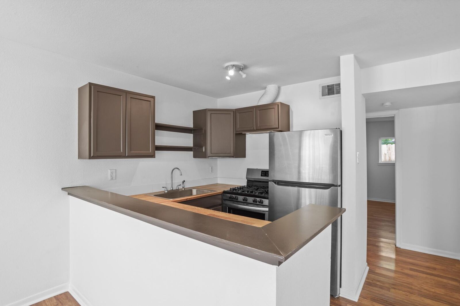 Property Photo:  1408 Hughes Street 12  TX 77023 