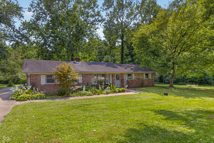 Property Photo:  6211 E Southport Road  IN 46237 