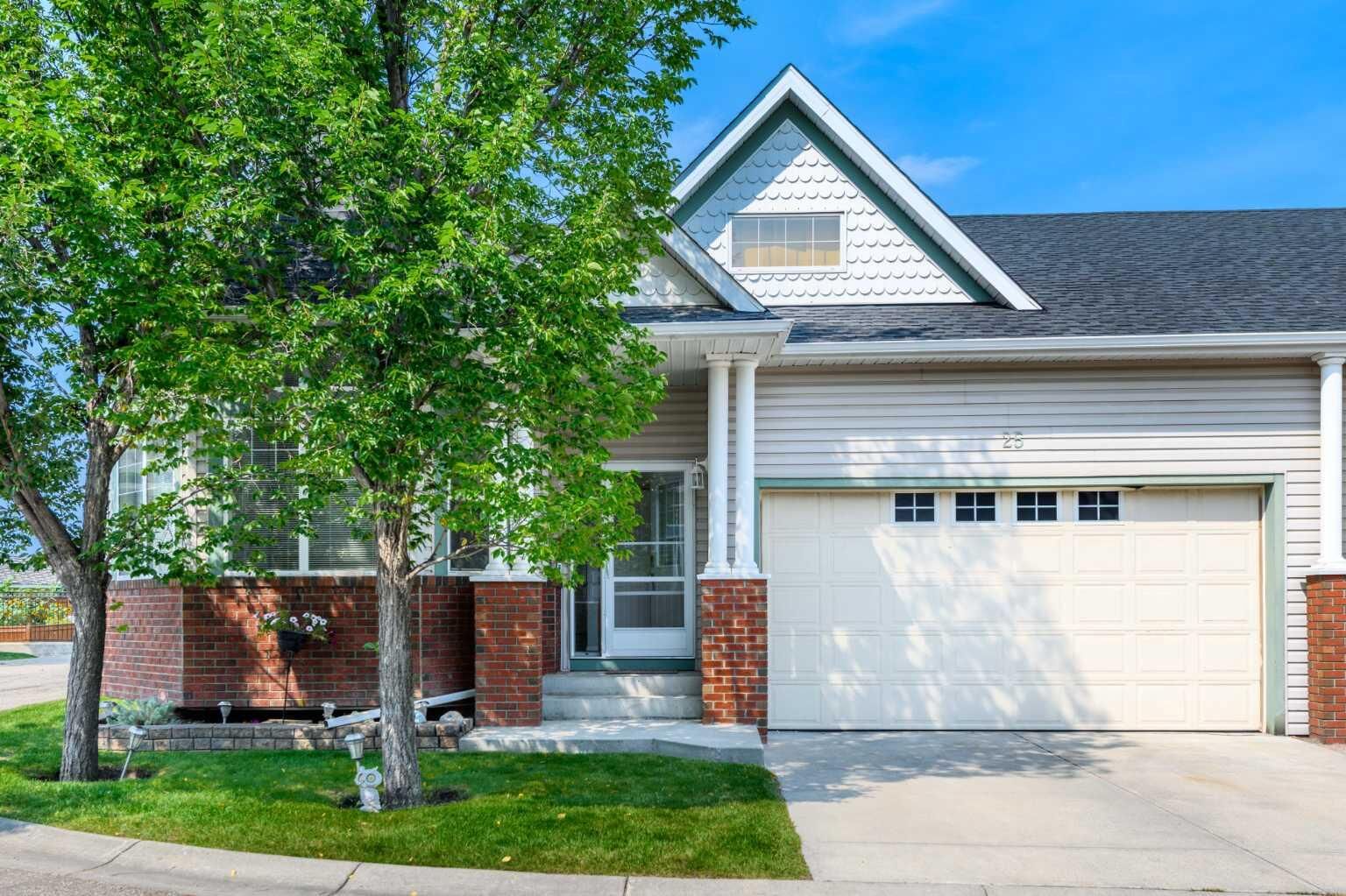 Property Photo: 25 Prestwick Pond Terrace SE AB T2Z 2K1
