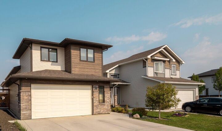 Property Photo: 1369 Pacific Circle W AB T1J 5V3