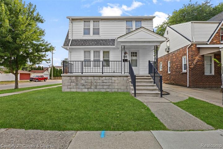 Property Photo:  6401 Payne Avenue  MI 48126 
