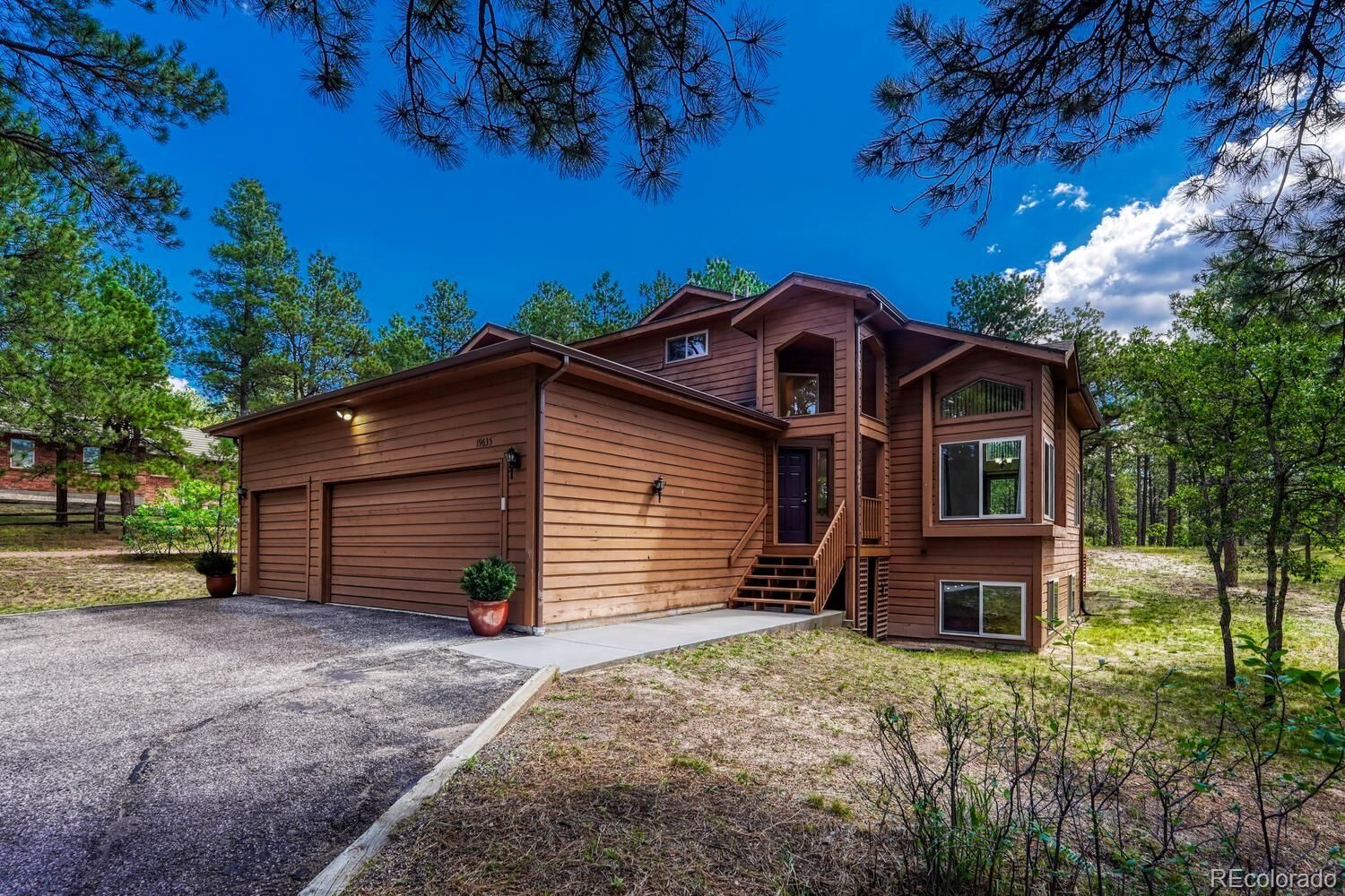 Property Photo: 19635 W Top O The Moor Drive CO 80132