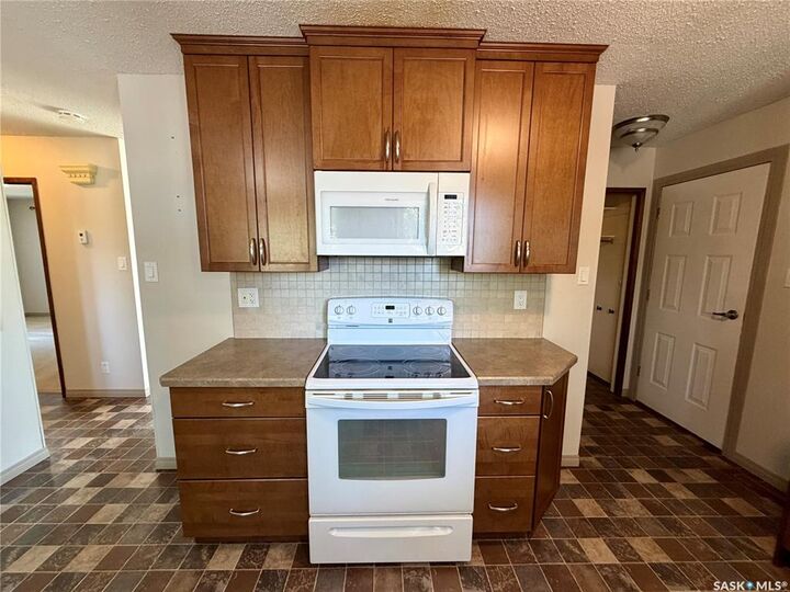 Property Photo: 97 Burke Crescent SK S9H 4E4