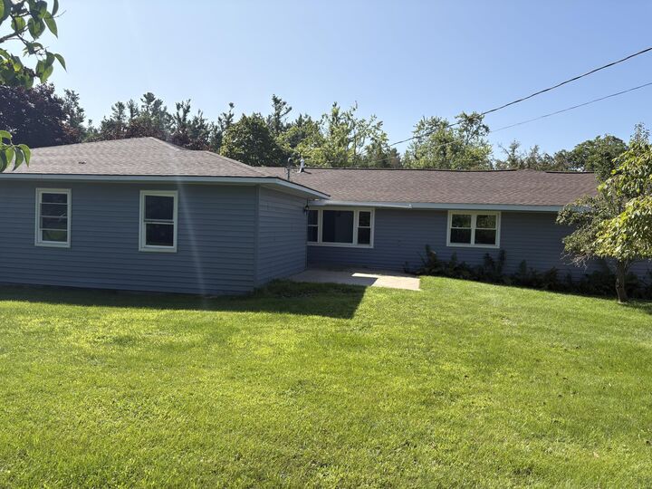Property Photo:  211 Princeton Avenue  MI 49707 