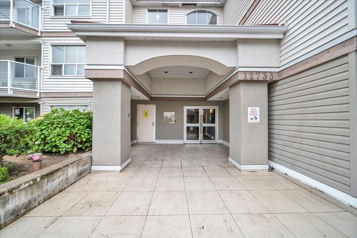 Property Photo: 12733 72 Avenue 103 BC V3W 2M7