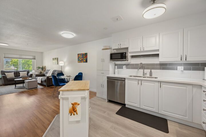 Property Photo:  5765 Glover Road 202  BC V3A 8M8 