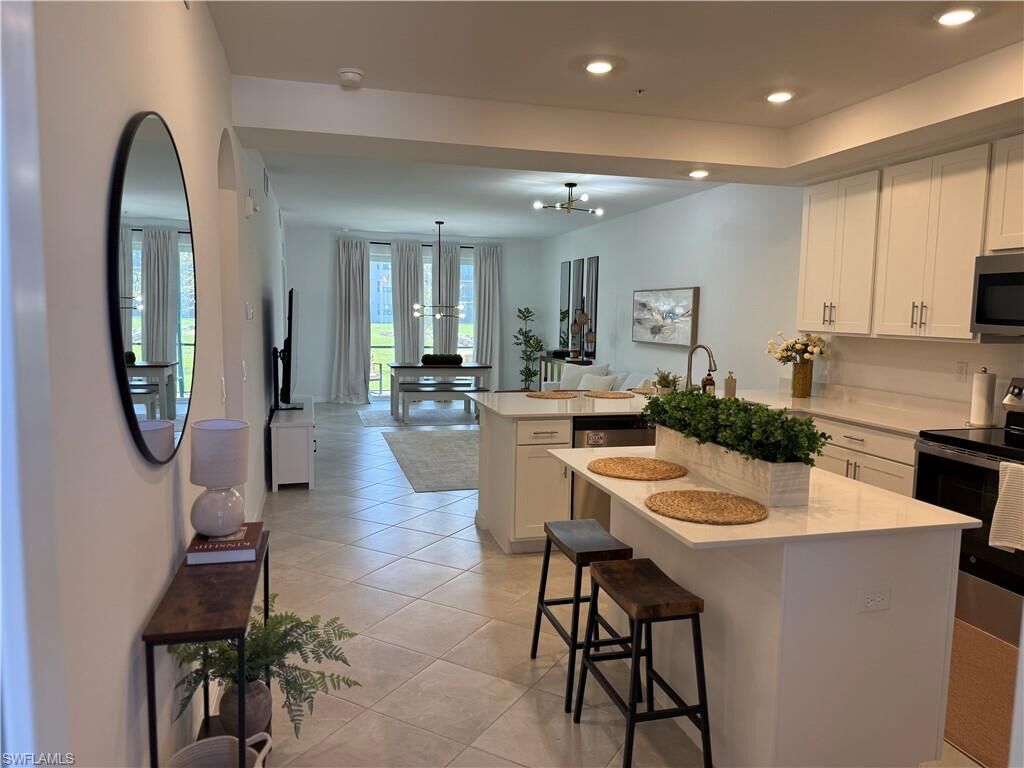 Property Photo:  18421 Copperhead Ct N 215  FL 33936 