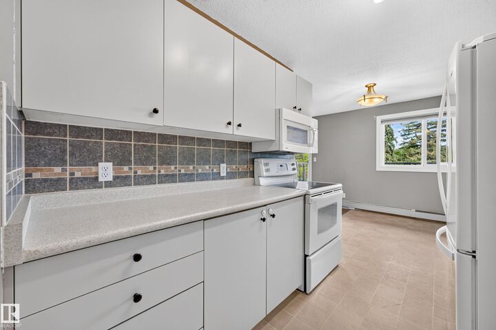 Property Photo:  13450 Fort Road NW 7  AB T5A 1C5 