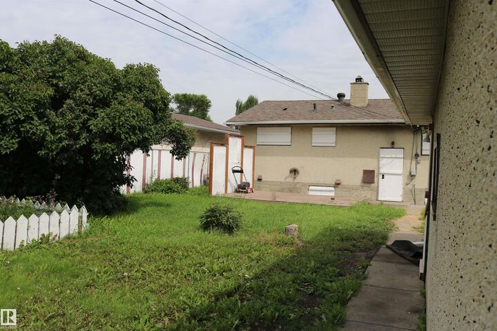 Property Photo:  13604 64 Street NW  AB T5A 0Y9 