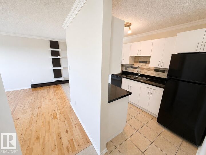 Property Photo:  10904 159 Street NW 11  AB T5P 3C1 