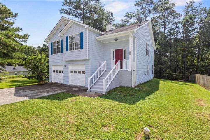 Property Photo:  5604 Rockingwood Lane  GA 30349 